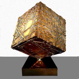 Angelo Rinaldi, Mark, scultura cubica in bronzo dorato con elementi in rilievo,cubo rotante su base, cubo h.cm.21x21, anno 1999
